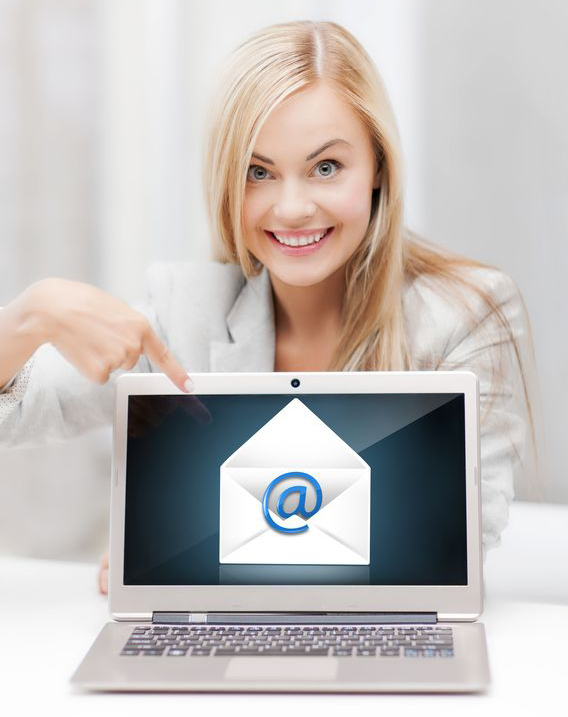 woman pointing at computer screen with an email symbol on it